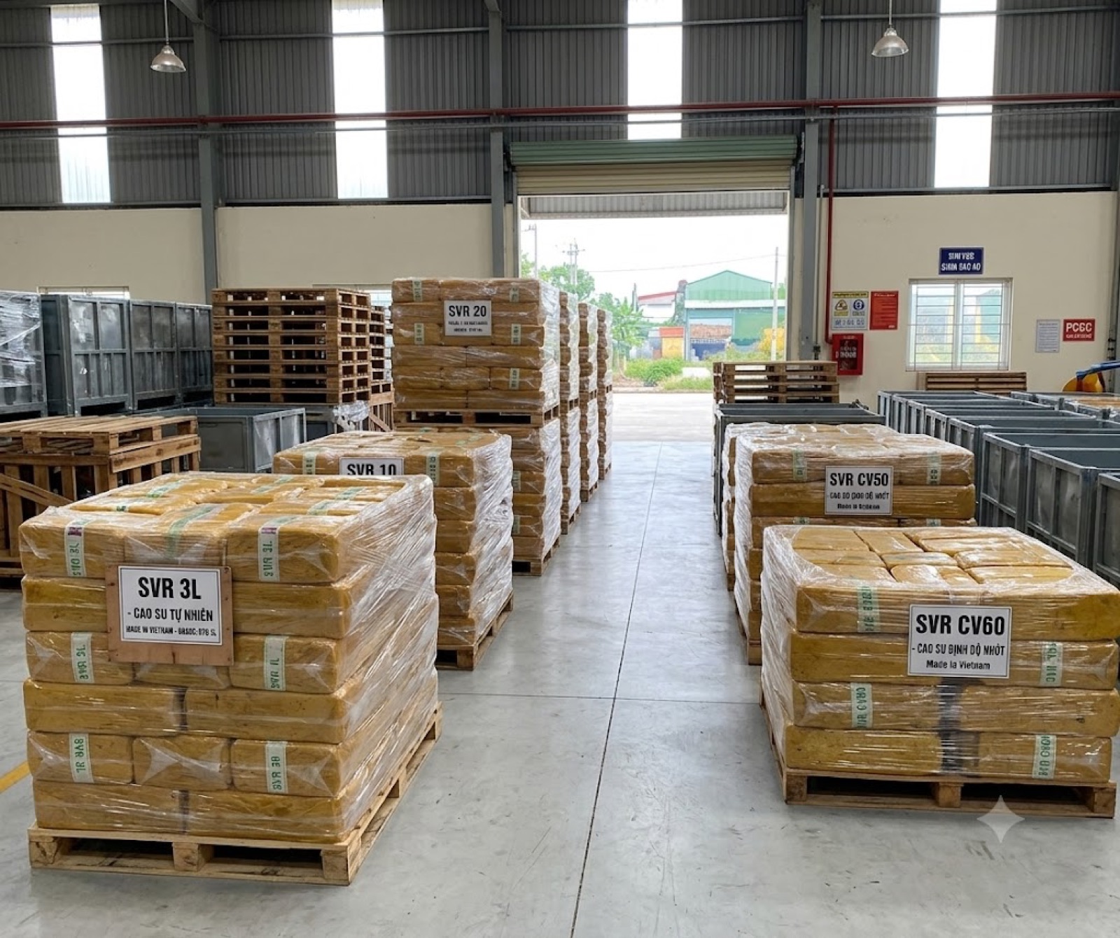 Palletised SVR 3L, SVR 10, SVR 20 and SVR CV60 block rubber in the VHHC warehouse